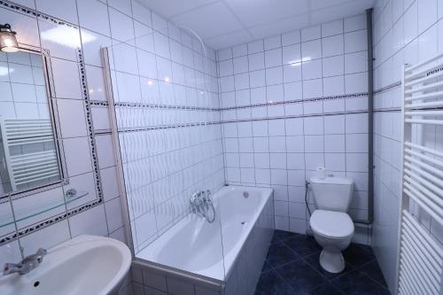 Ett badrum på La Vieille Ferme Chassepierre