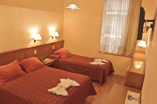 Hotel Felipe IIにあるベッド
