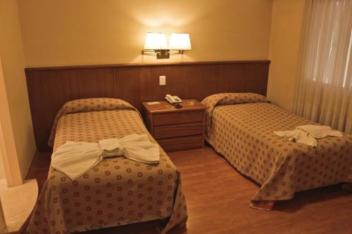 Hotel Felipe IIにあるベッド