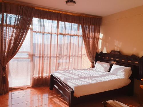 Voodi või voodid majutusasutuse Alef Paradise Hotel toas