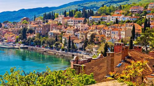 a view of a town next to a river at TERRA MAGICA DELUXE Apartment Or Room with Private Parking, Terrace and Sea View in Rijeka