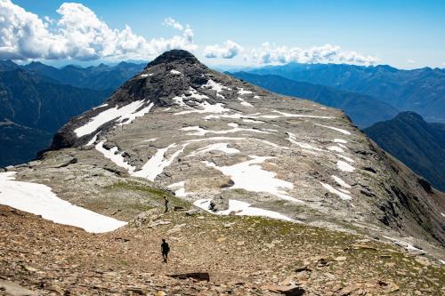 a person standing on the side of a mountain at Hotel La Vetta in San Domenico