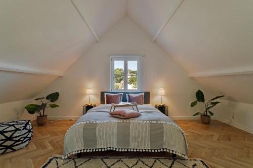 Tempat tidur dalam kamar di Scheldewegel Vakantiehuis