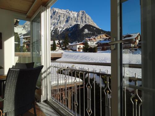 a balcony with a view of a mountain at Appartements Loisachpromenade in Ehrwald
