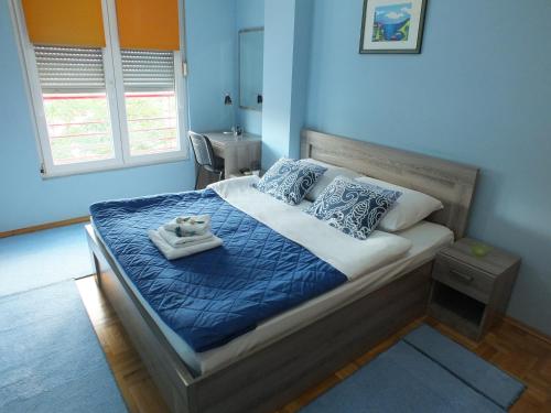 Кровать или кровати в номере Apartment Temple