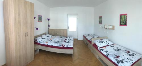 Postel nebo postele na pokoji v ubytování Apartmány Toufar