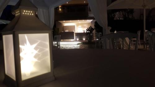 a lantern with a star in the middle of a room at Sunshine Club Hotel Centro Benessere in Ricadi
