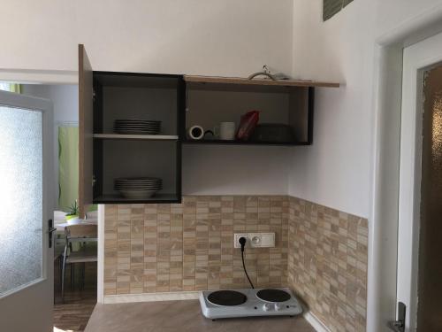 Kuchyň nebo kuchyňský kout v ubytování Apartmány Toufar