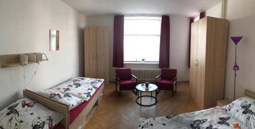 Vuode tai vuoteita majoituspaikassa Apartmány Toufar