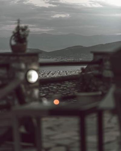 a blurry picture of a view of the ocean at Archontiko Argyro in Makrinítsa