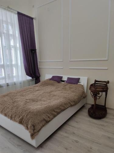 Ένα ή περισσότερα κρεβάτια σε δωμάτιο στο Apart 26