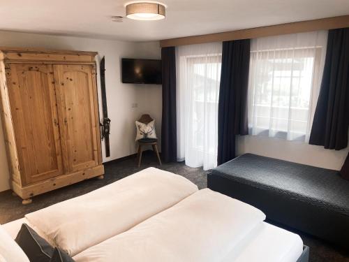 Una cama o camas en una habitación de Ferienhaus Ragg
