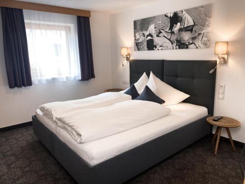Una cama o camas en una habitación de Ferienhaus Ragg
