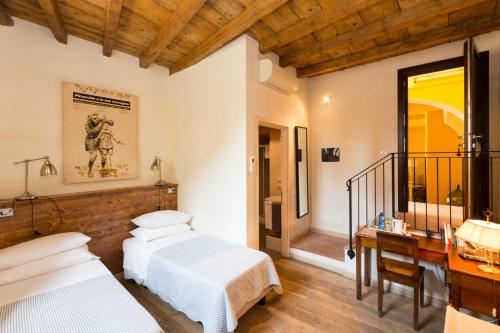 Postel nebo postele na pokoji v ubytování B&B Corte delle Muse