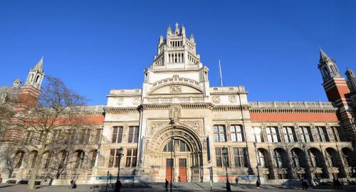 a large building with a tower on top of it at Astor Hyde Park Hostel in London