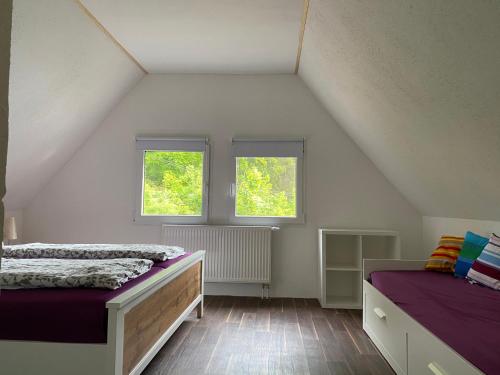 Ferienanlage Geisingblick tesisinde bir odada yatak veya yataklar