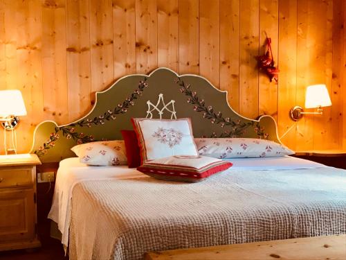 Ένα ή περισσότερα κρεβάτια σε δωμάτιο στο Appartamenti Pichler