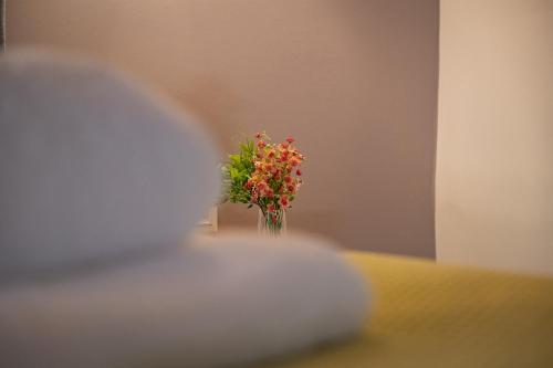 Postel nebo postele na pokoji v ubytování Fresh Living Suites