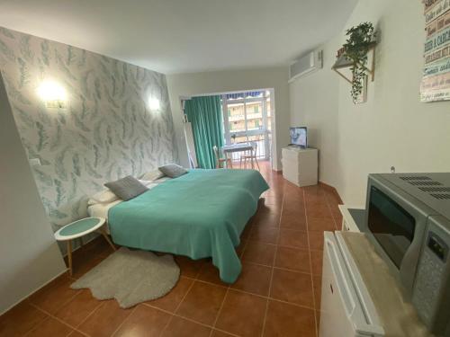 Llit o llits en una habitació de Fun-sun