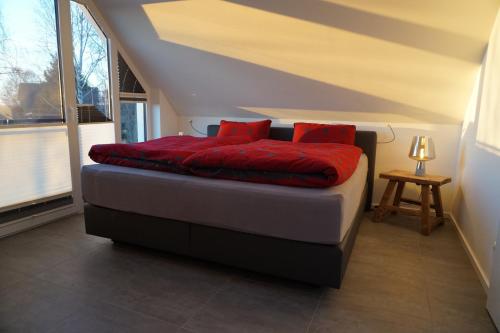 Ferienhaus Marny tesisinde bir odada yatak veya yataklar