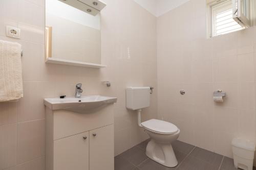 Koupelna v ubytování Apartmani Perak