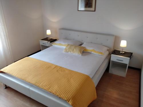 Posteľ alebo postele v izbe v ubytovaní Apartman Avsec