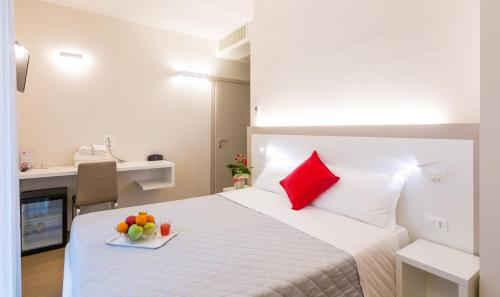 Postel nebo postele na pokoji v ubytování Hotel Amicizia