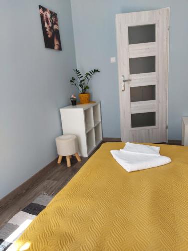Ένα ή περισσότερα κρεβάτια σε δωμάτιο στο Apartament Wągrowiec, Gabi - Remigiusz Kiszka