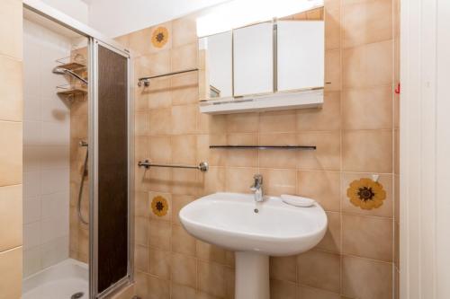 a bathroom with a sink and a shower at Studio les Granges - Vue montage et village, Centre la Clusaz - AravisTour in La Clusaz