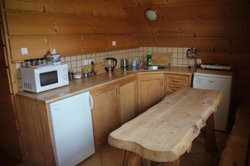 Kuchyňa alebo kuchynka v ubytovaní Swistowka