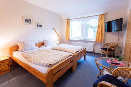 Postel nebo postele na pokoji v ubytování Rhododendronhof