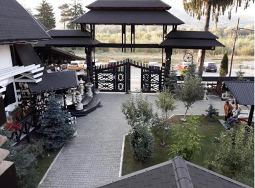 an overhead view of a patio with a gazebo at Complex Lions Bucovina in Voronet