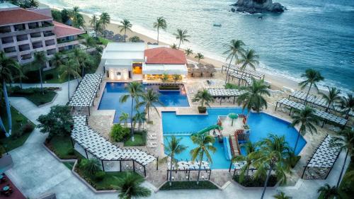 an aerial view of a resort with a swimming pool at Barceló Huatulco in Santa Cruz Huatulco