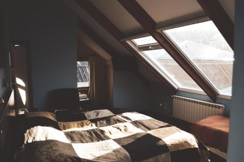 Una cama o camas en una habitación de Hosteria Foike