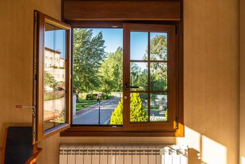 a window with a view of a street at Casa Almoravid in Daroca de Rioja