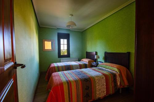Ein Bett oder Betten in einem Zimmer der Unterkunft Casa Almoravid