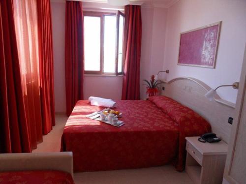 Cama o camas de una habitación en Hotel Belvedere