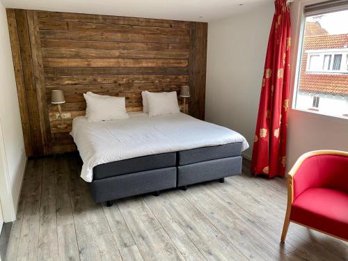 Ένα ή περισσότερα κρεβάτια σε δωμάτιο στο Paping Hotel & Spa - Rest Vonck by Flow