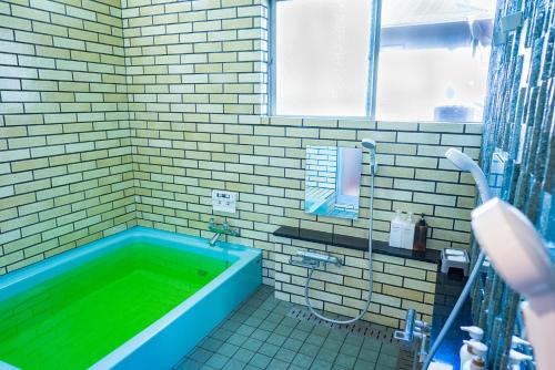 Kylpyhuone majoituspaikassa Ryokan Fuji Heights