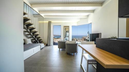 Una televisión o centro de entretenimiento en Lofos Village Chania