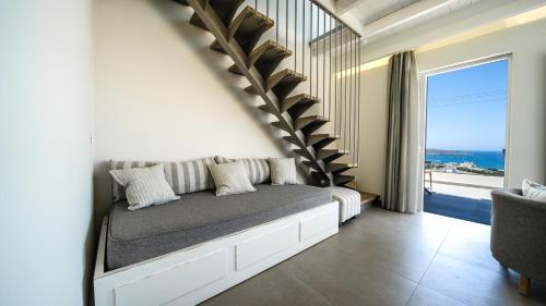 Una cama o camas en una habitación de Lofos Village Chania