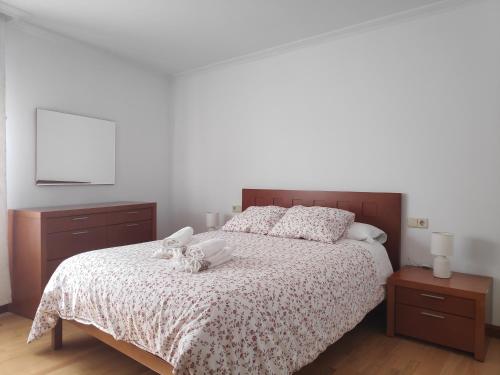 Postel nebo postele na pokoji v ubytování Apartamento Naval