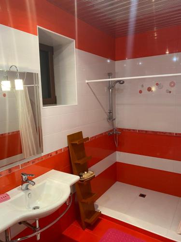 a bathroom with a sink and a shower at House Abel in Tsaghkadzor