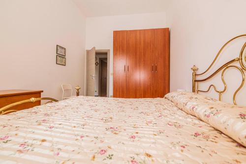 Кровать или кровати в номере Casa Vacanze Cattolica