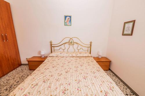 Кровать или кровати в номере Casa Vacanze Cattolica