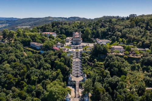 an aerial view of a building in a forest at Sense of Ofir in Fão