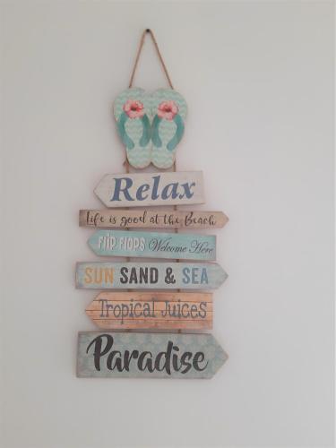 Sagres Relax Studiosに飾ってある許可証、賞状、看板またはその他の書類