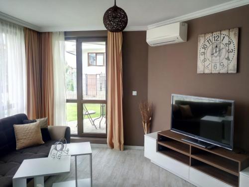 A television and/or entertainment centre at Bayview apartments Todorov