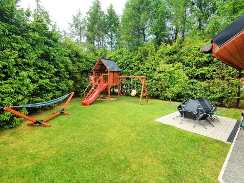 Herní místnost nebo prostor pro děti v ubytování Domek Adusiówka