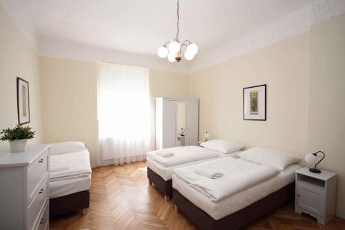 Lova arba lovos apgyvendinimo įstaigoje Prague Central Exclusive Apartments